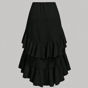 Asymmetrisk långkjol med volanger och drapering