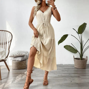 Beige klänning med volang