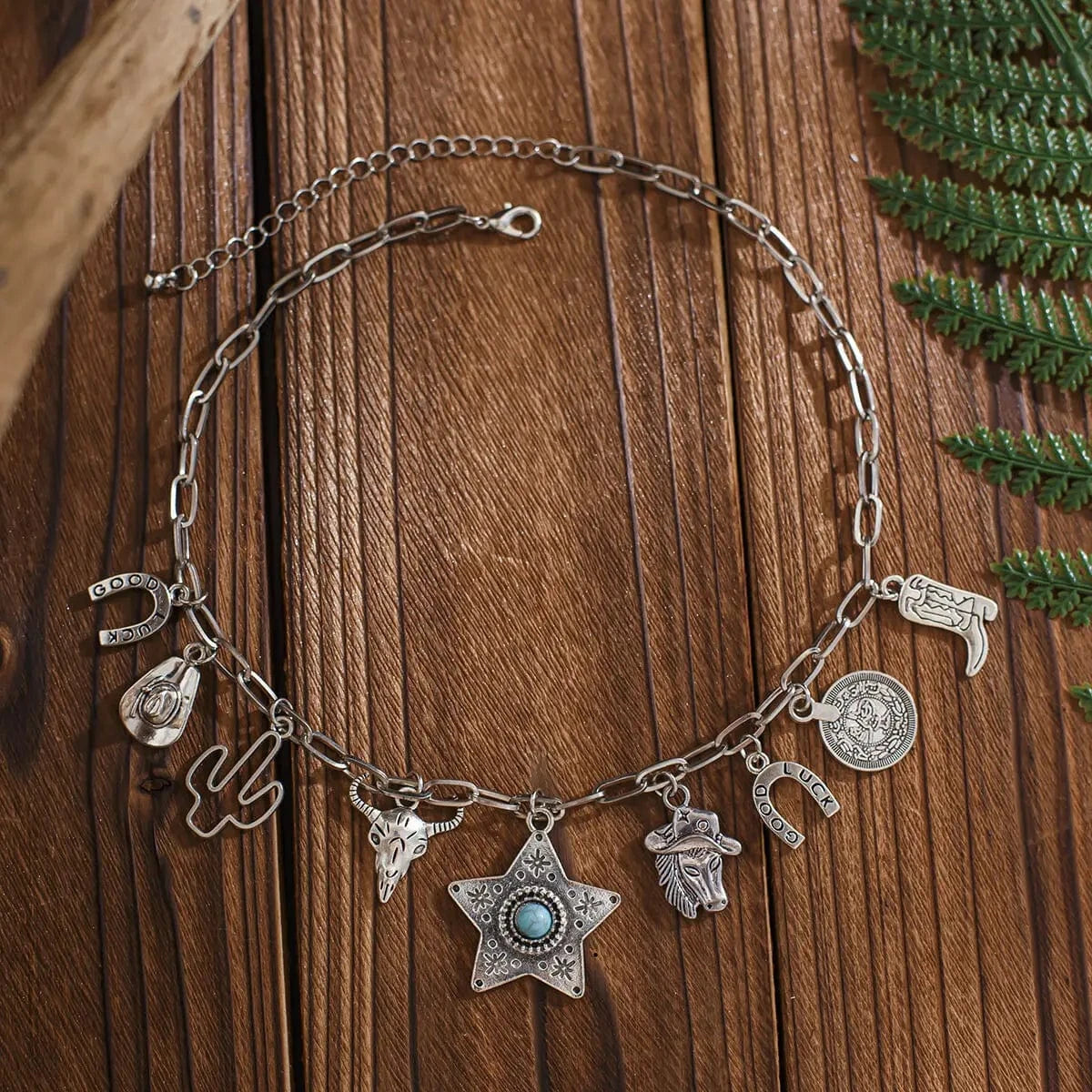 Berlockhalsband i western stil med western-motiv och turkos