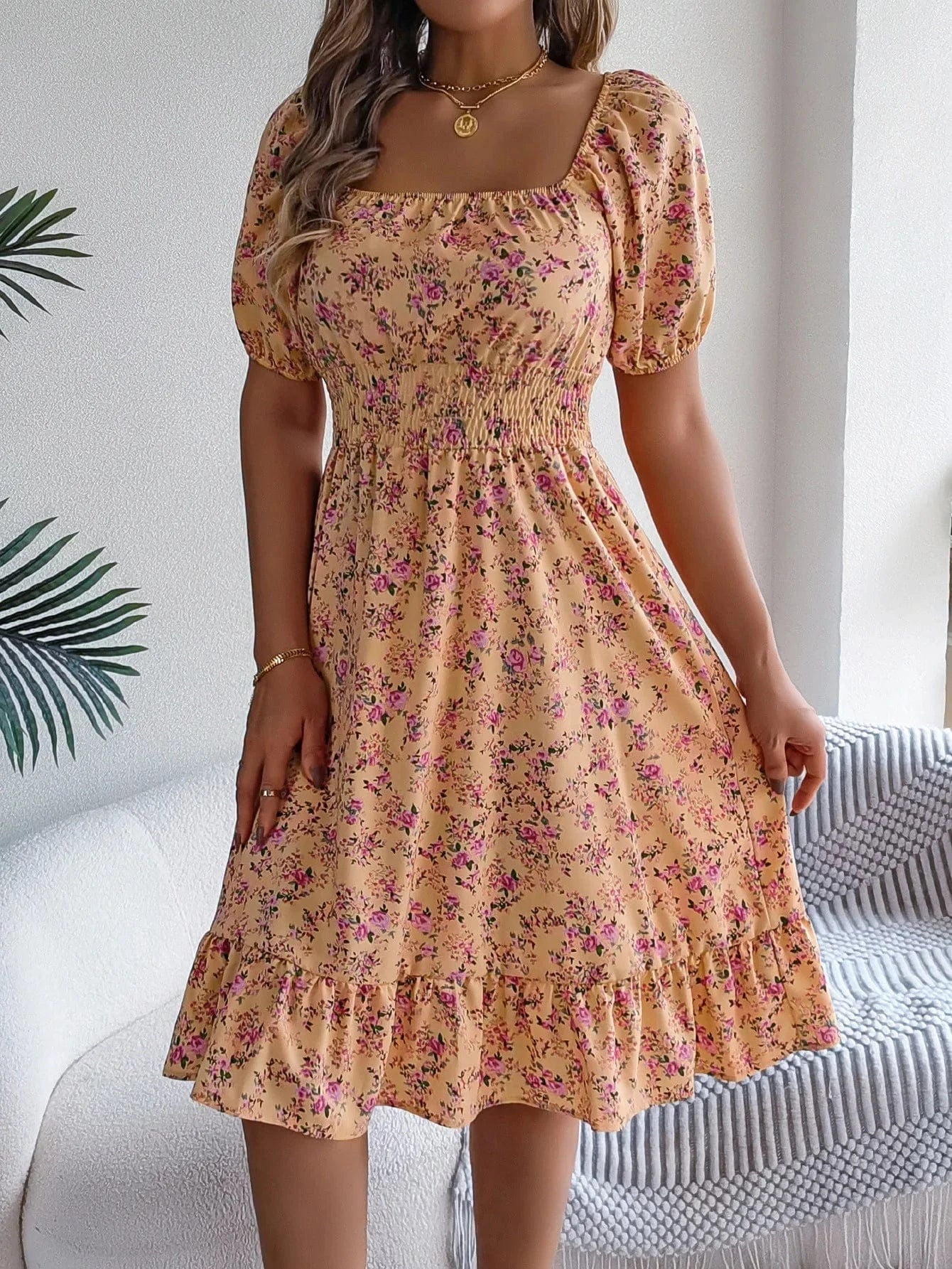 Blommig off-shoulder midiklänning