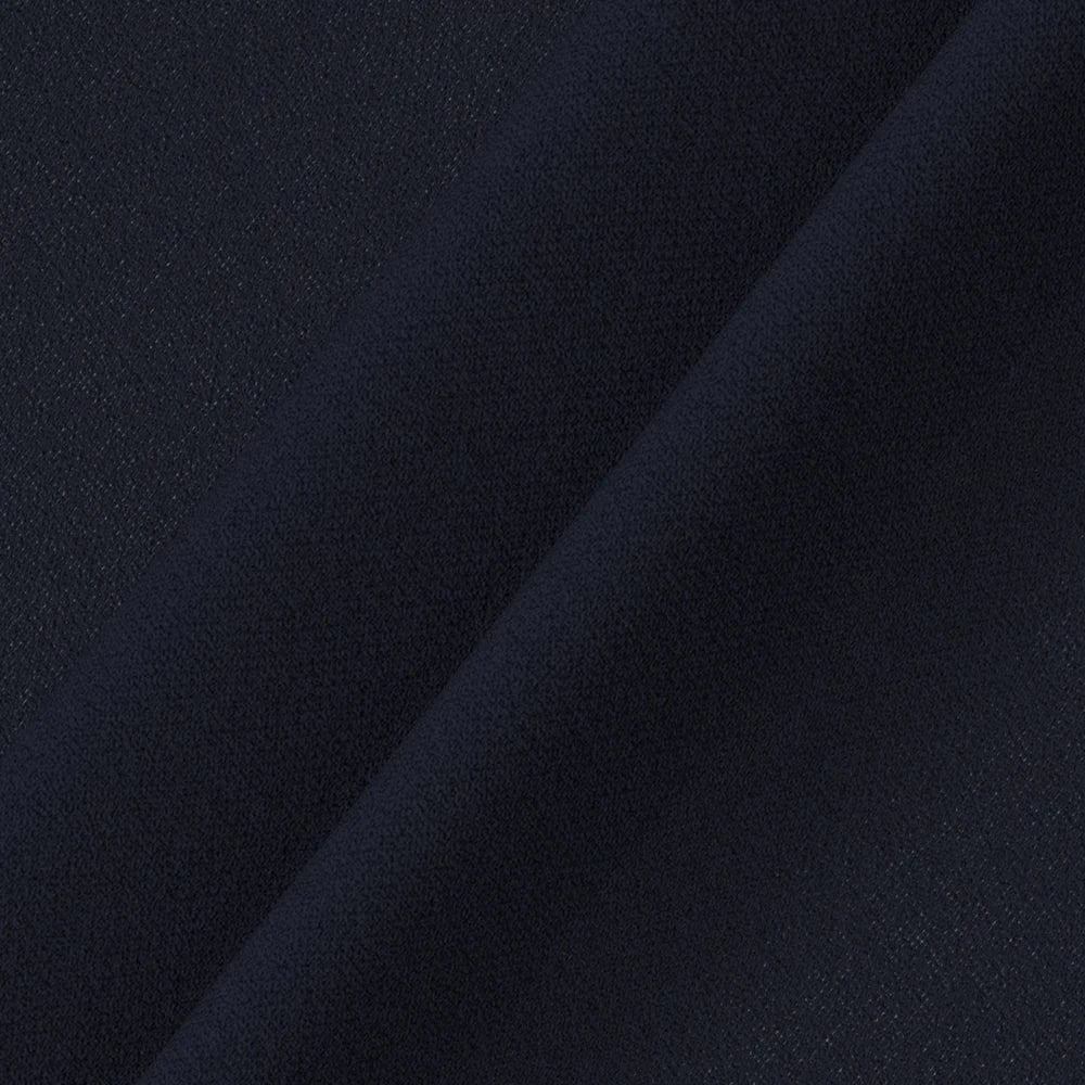 Blus med transparenta rutiga ärmar