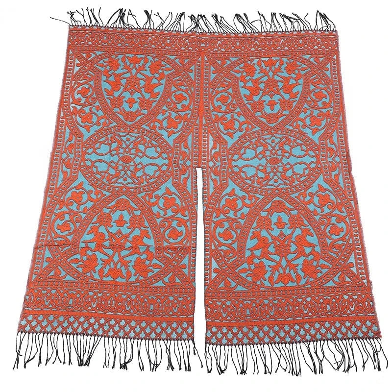 Öppen poncho med blommigt jacquardmönster