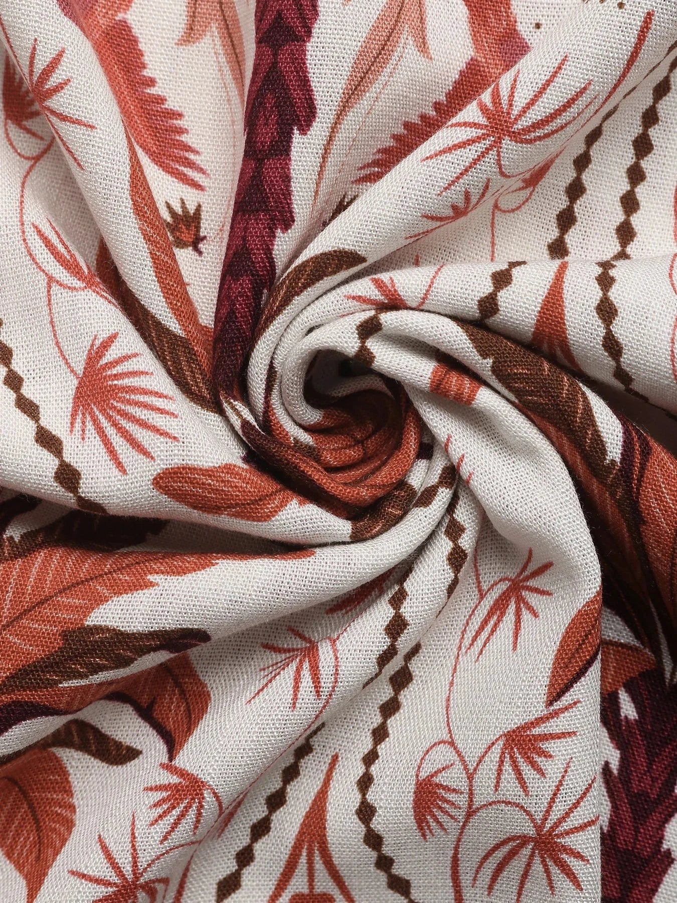 Sommarklänning med palmbladsmönster