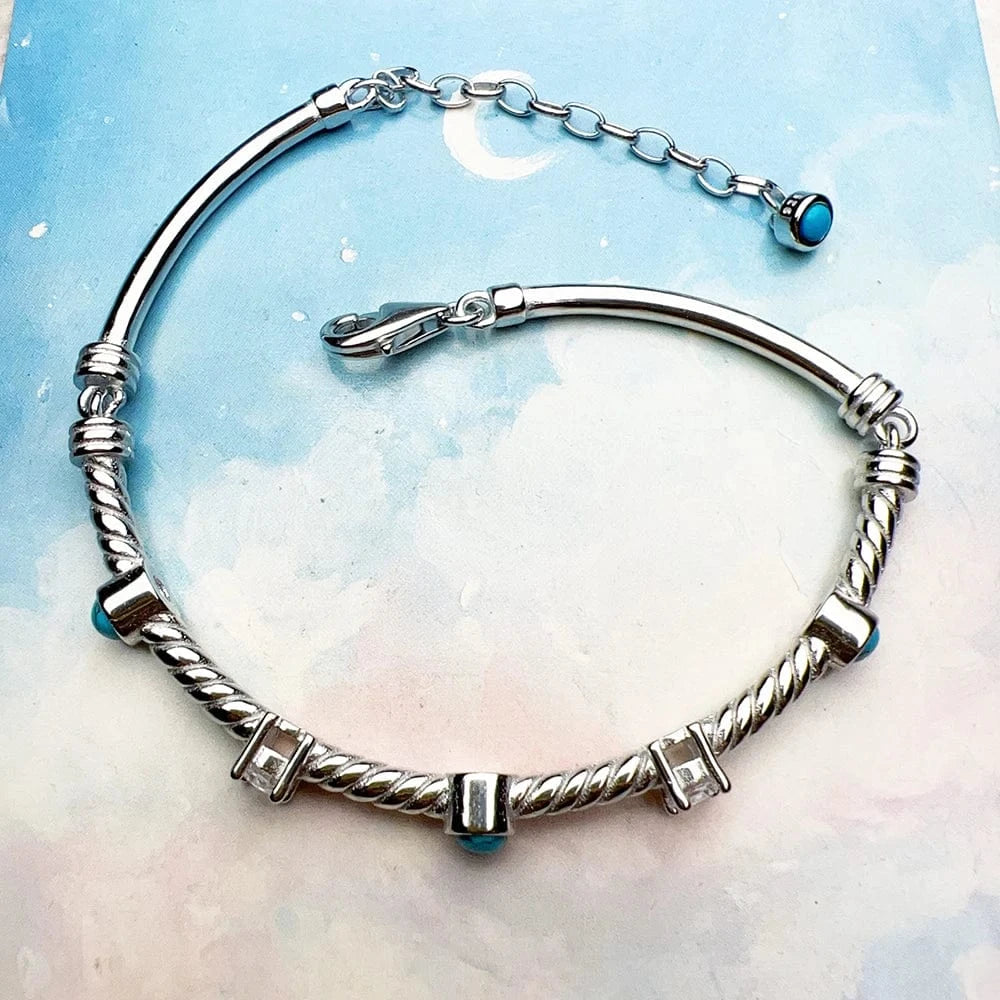 Stelt Silverarmband med Vriden Design och Turkosa Stenar Silver med turkos